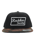 Load image into Gallery viewer, OG Black/Camo Trucker Hat
